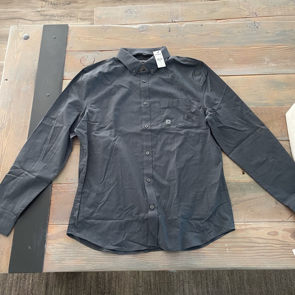 Brand new with tags, never worn. Express shirt size medium. Dark grey color.